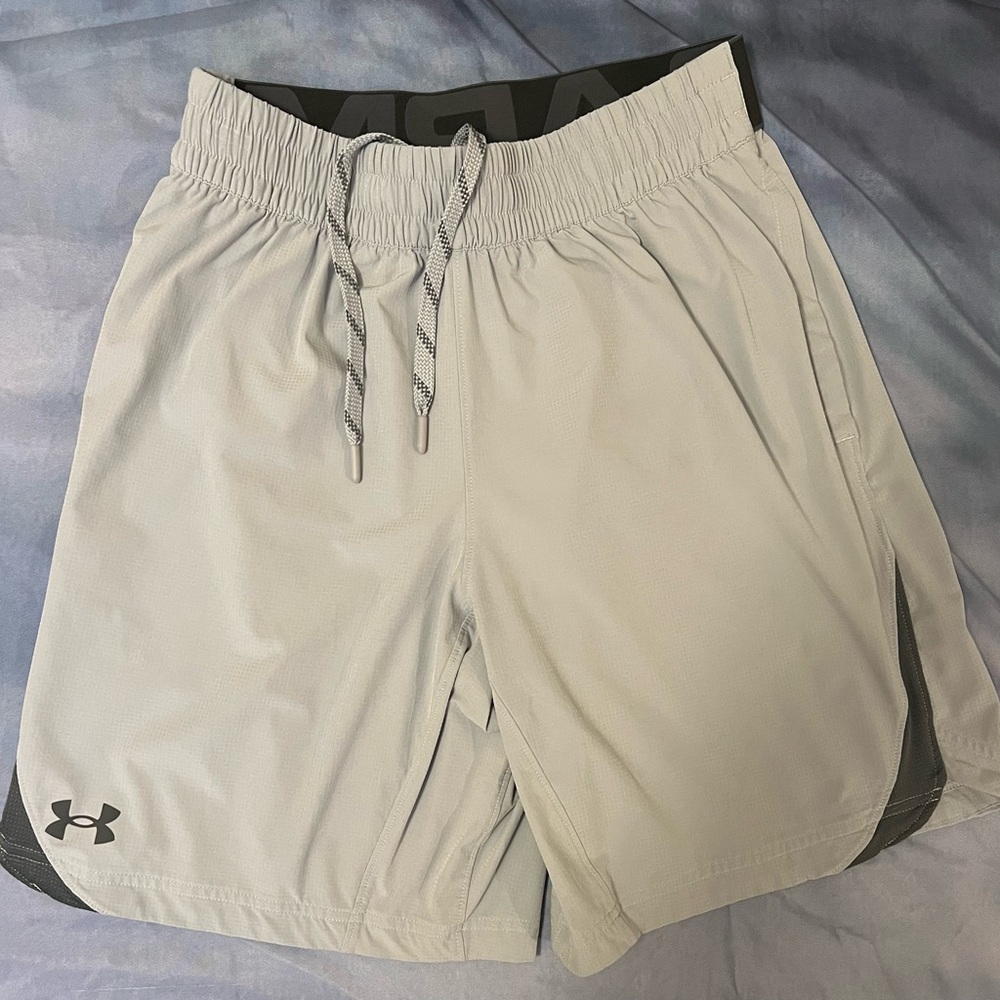 Two pair of men’s size medium Under Armour Dri-fit shorts